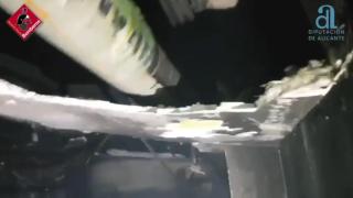 Un bebé, un niño y seis mujeres, heridos en el incendio de un garaje de una urbanización en Torrevieja