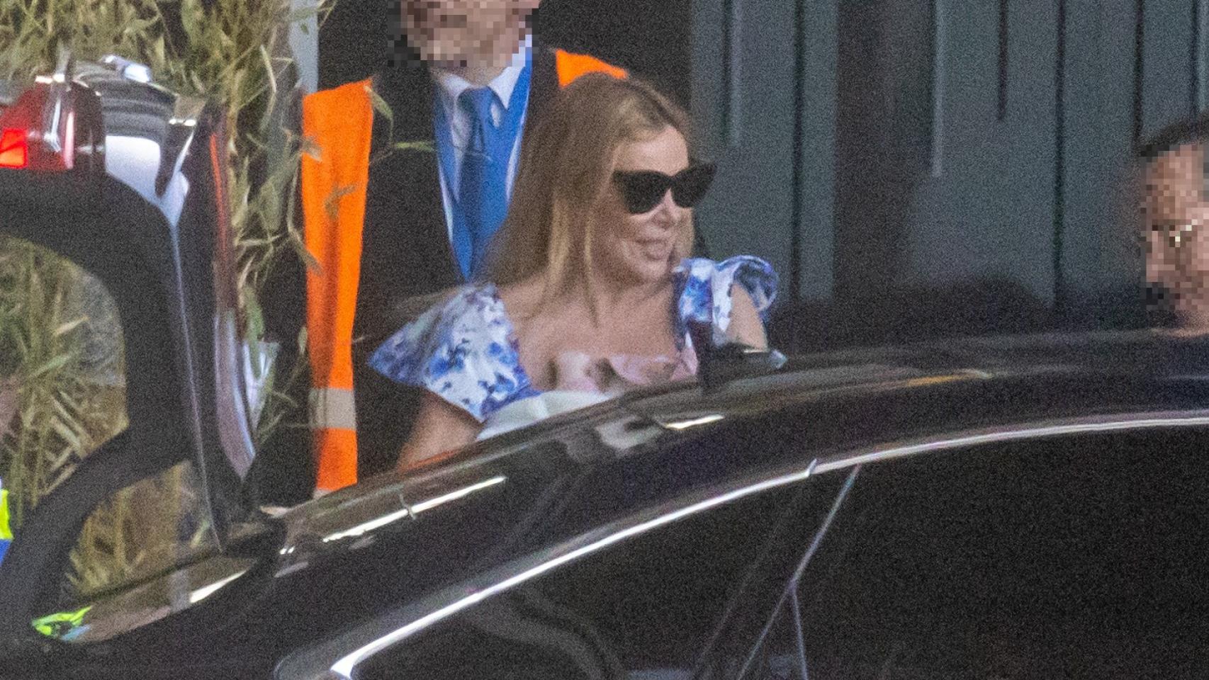 Ana García Obregón, wearing sunglasses and a flowery dress, upon her arrival in Madrid this Wednesday, May 31.