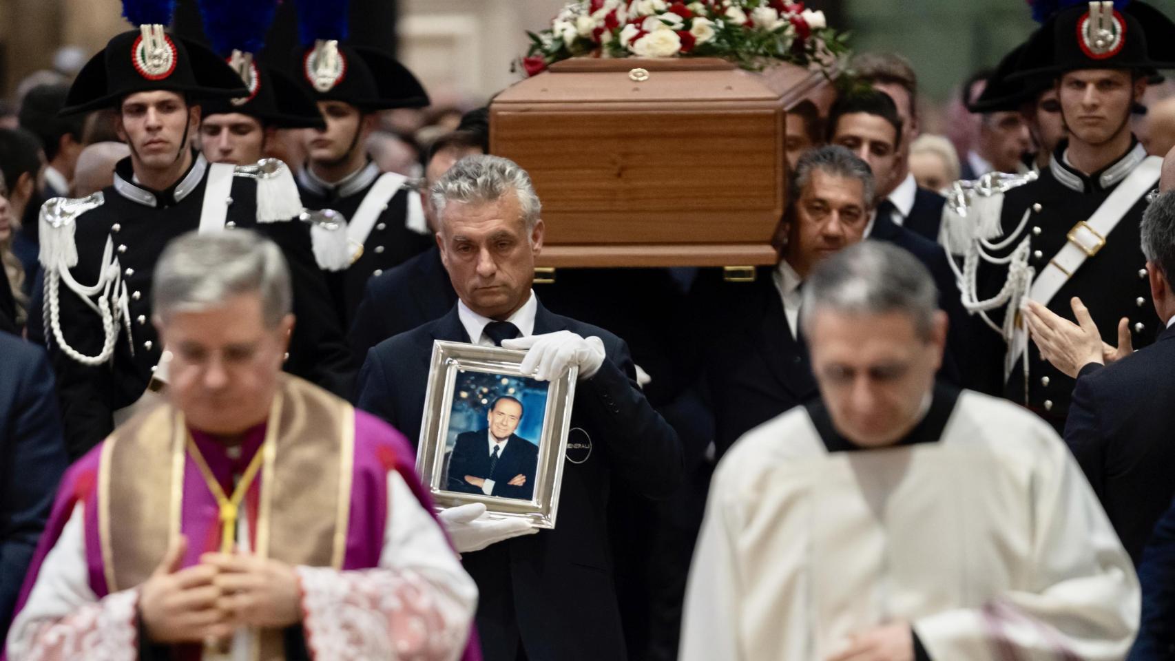 A portrait of Silvio Berlusconi before his coffin during the state funeral at the Duomo in Milan.