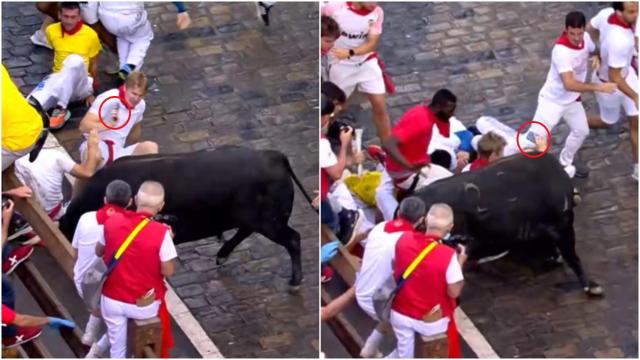 Un joven graba con su teléfono móvil mientras corre el tercer encierro de San Fermín