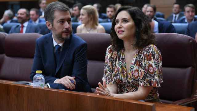 El consejero de Presidencia, Justicia y Administración Local, Miguel Ángel García, y la presidenta de la Comunidad de Madrid y del PP de Madrid, Isabel Díaz Ayuso.