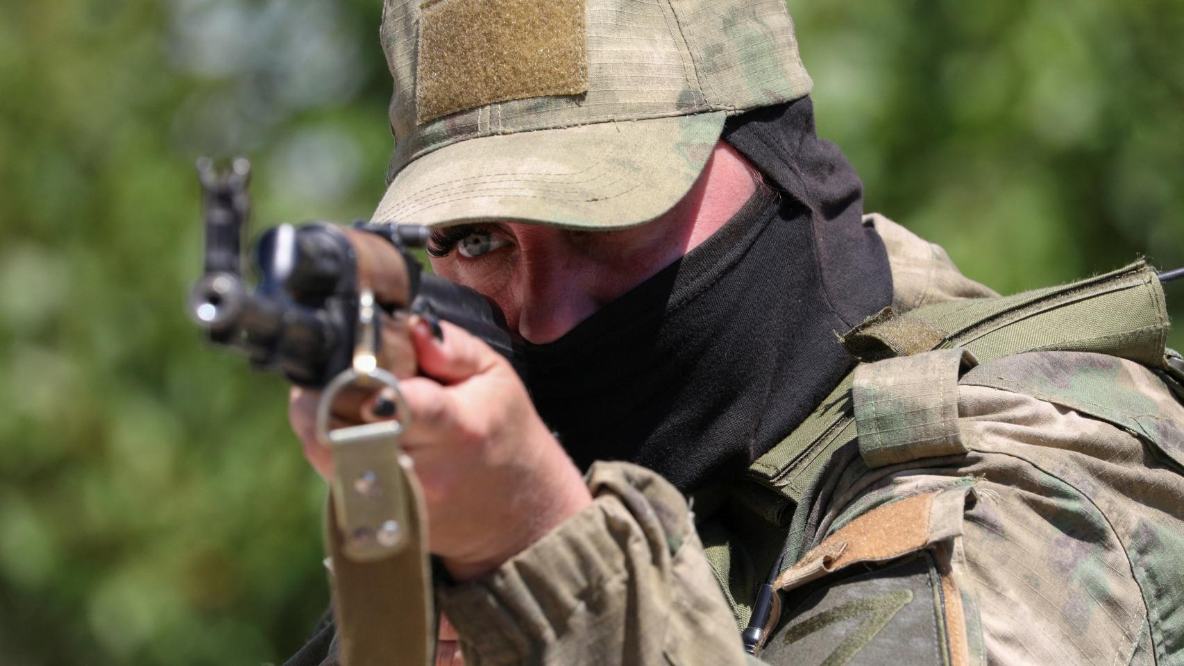 Member of a female territorial defense unit at a firing range near Yevpatoriya, Crimea.