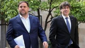 Los líderes de ERC y Junts, Oriol Junqueras y Carles Puigdemont.