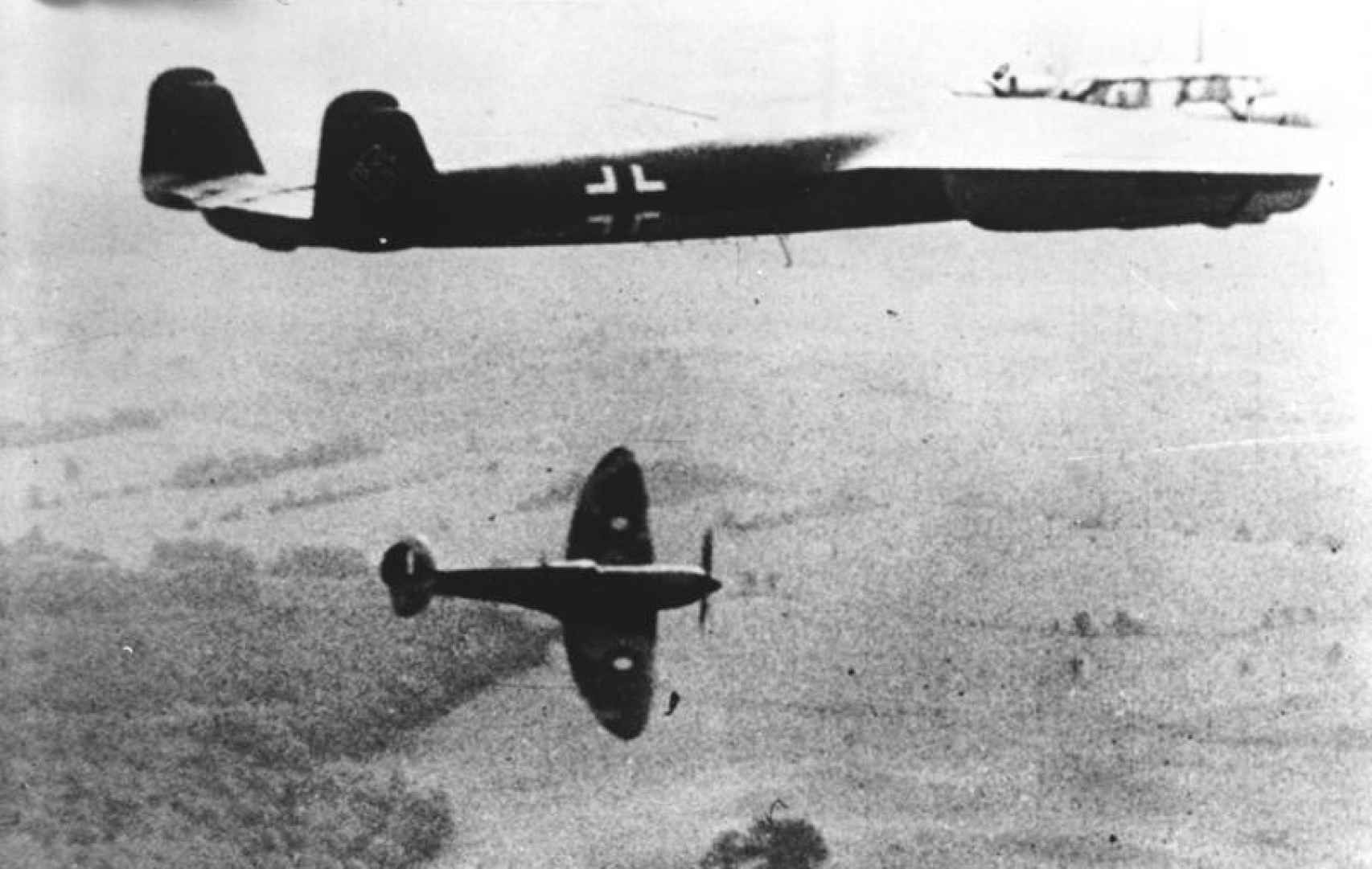 A Spitfire Attacks A German Bomber During The Battle Of Britain.