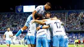 Los jugadores del Málaga CF celebran un gol en La Rosaleda