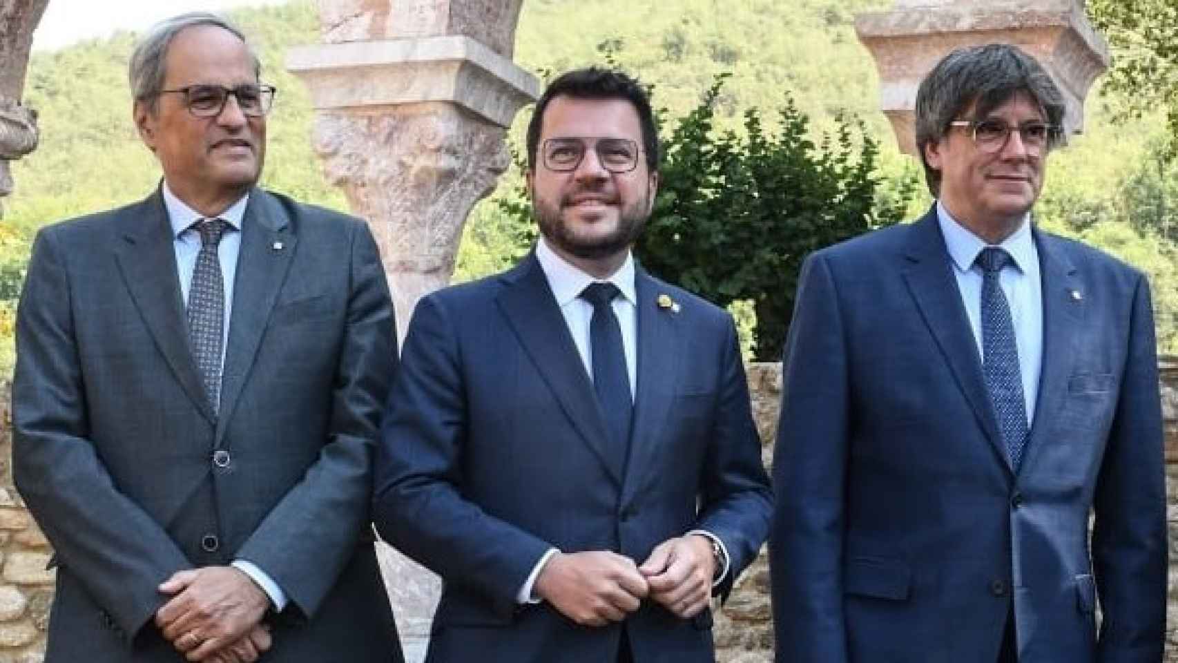 de izqda. a dcha.: Joaquim Torra, Pere Aragonès y Carles Puigdemont, presidente de la Generalitat entre 2017 y 2022.