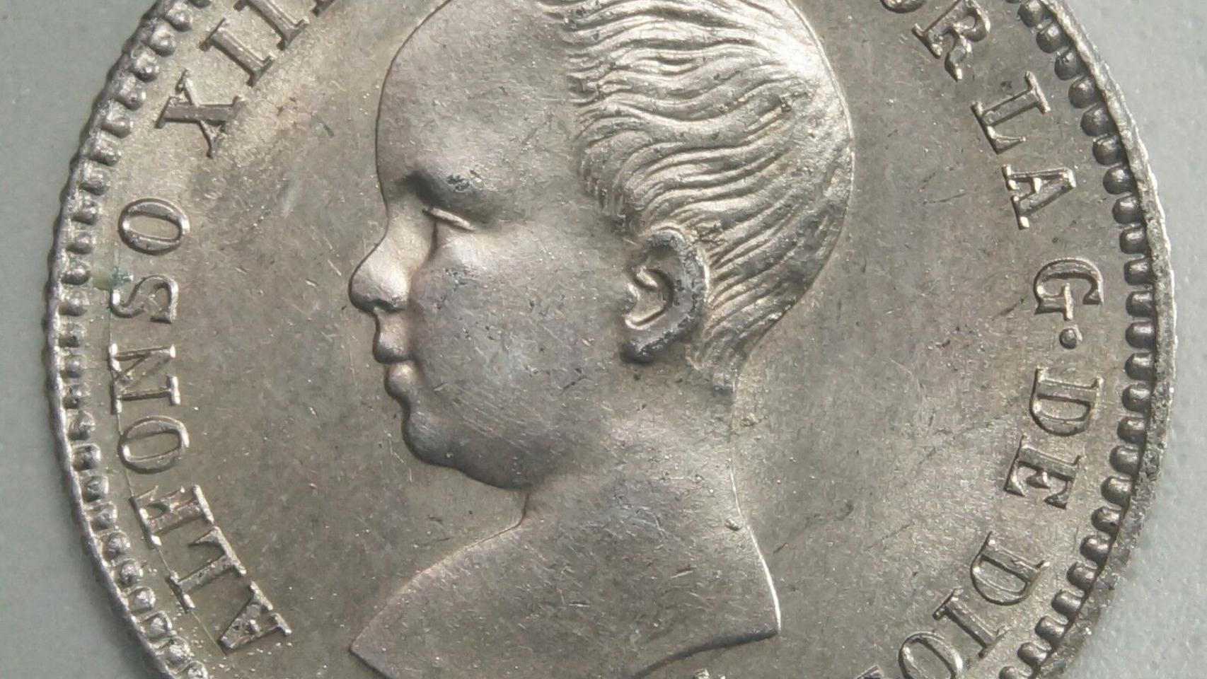 Moneda de Alfonso XIII con el sobrenombre de 'pelón'.
