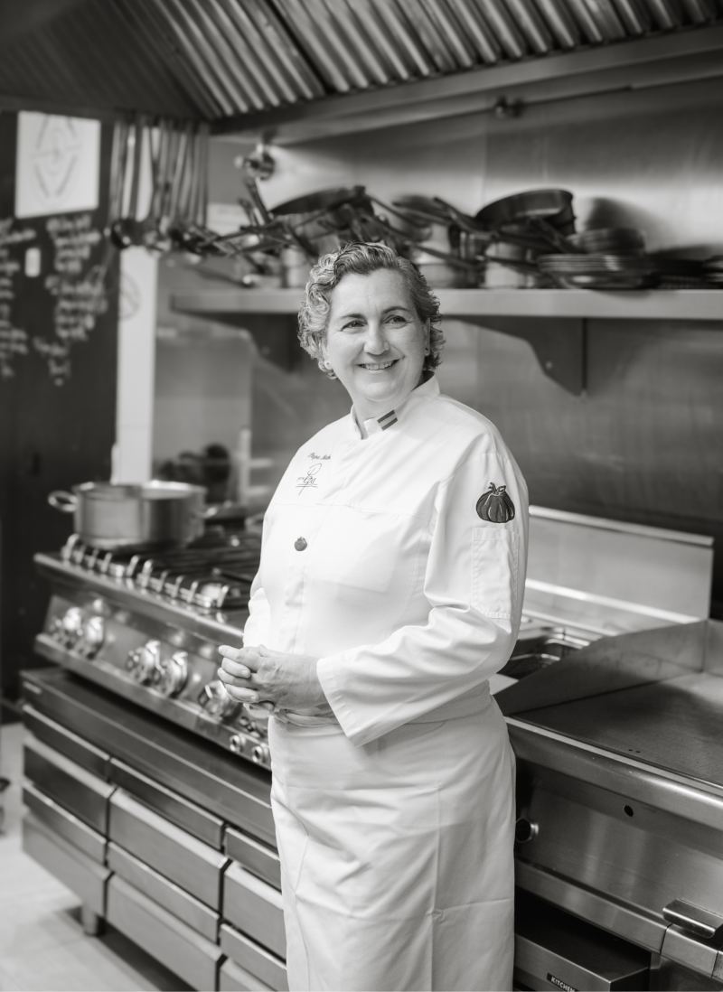 Foto uno de Pepa Muñoz con su uniforme de chef